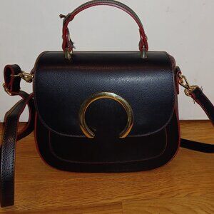 Italian black leather purse with red accents